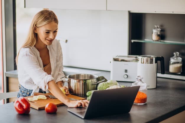 young woman preparing food kitchen 1303 24799