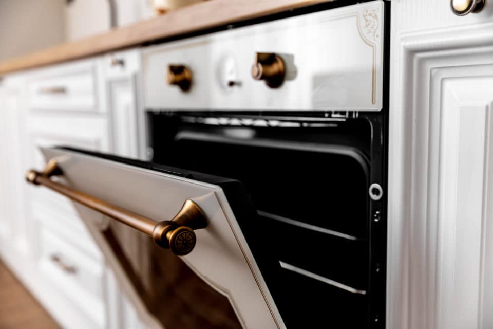 close up oven with golden details 960x640 1